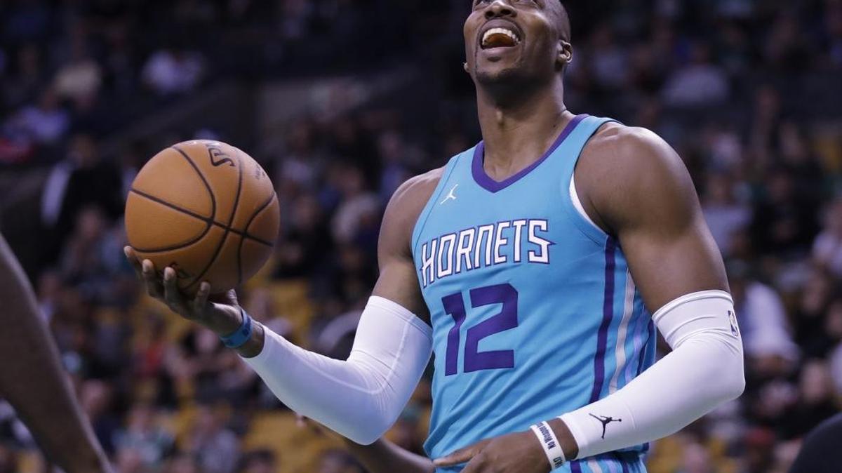 In his first preseason exhibition as a Charlotte Hornet, center Dwight Howard grabbed 10 rebounds and blocked three shots. But he also committed six turnovers.