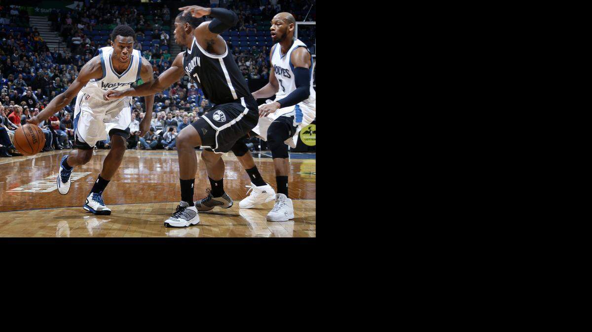
Andrew Wiggins (dribbling), the No. 1 pick in the 2014 NBA draft, was dealt to the Minnesota Timberwolves in the Kevin Love trade.
