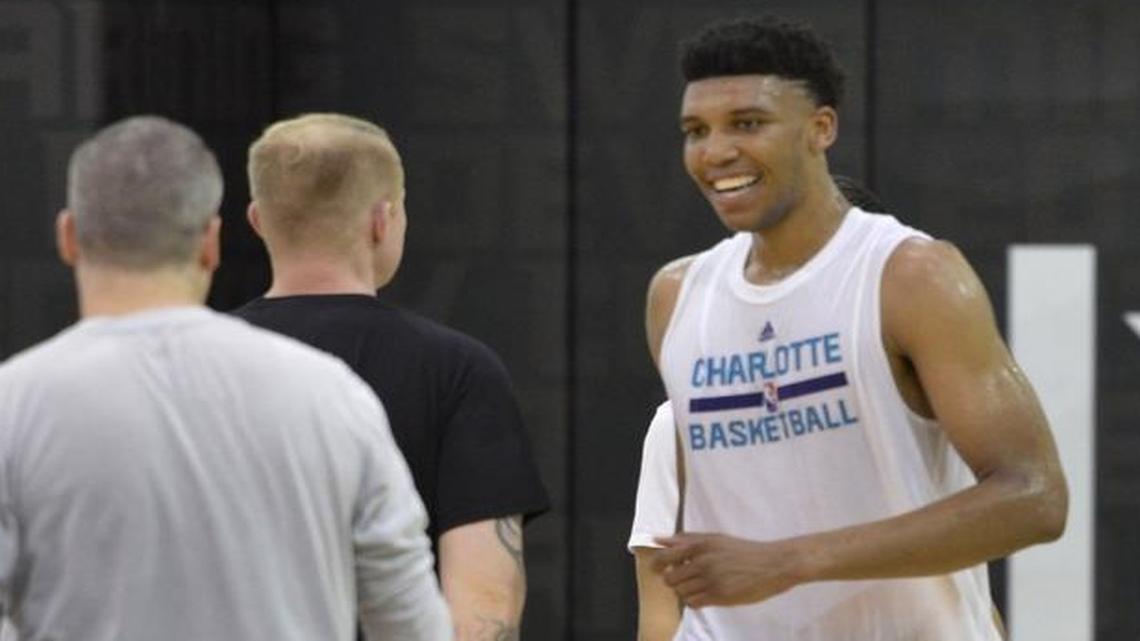 Former North Carolina player Tony Bradley (right) stayed in the NBA Draft, despite just one season of college basketball and a limited role with the Tar Heels.