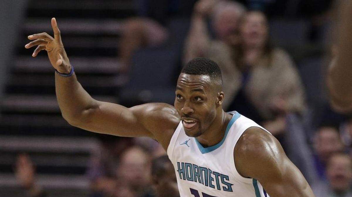 “We’re on the same page, and it’s going to stay that way,” says Charlotte Hornets center Dwight Howard (12), about teammate Kemba Walker.