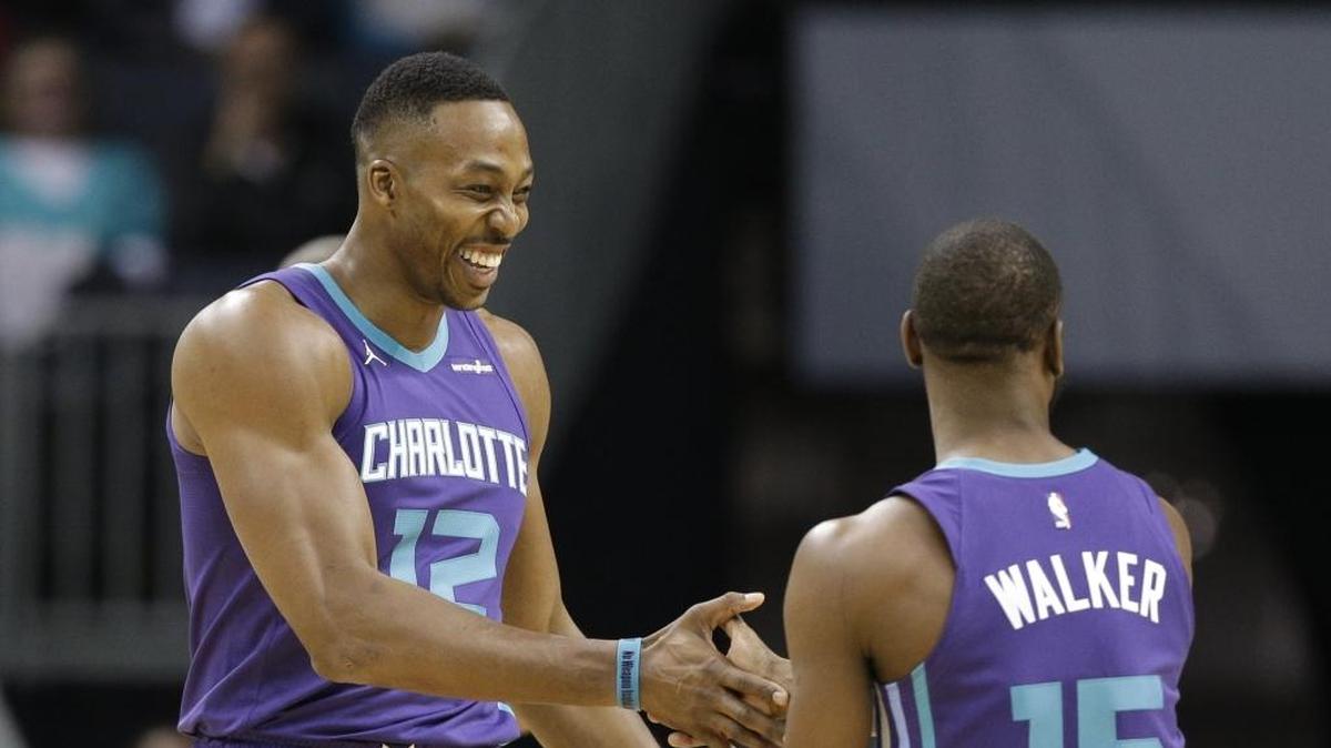 The Charlotte Hornets' go-to play at the end of games is a pick-and-roll between center Dwight Howard (12) and point guard Kemba Walker (15). They consistently lose those games of late.