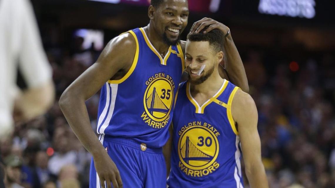 Kevin Durant (left) and Stephen Curry are Golden State’s stars, and there’s abundant depth around them as the Warriors set out to defend their NBA championship.