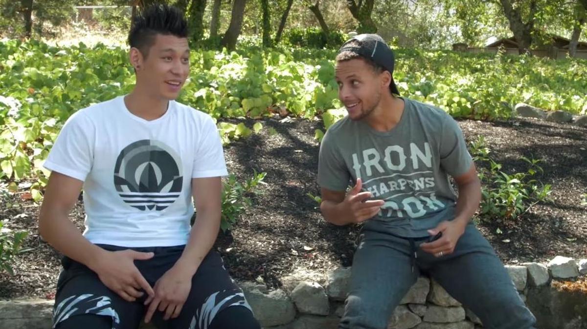 
Charlotte Hornets guard Jeremy Lin talks to Golden State Warriors guard Stephen Curry in Lin’s How to Fit in the NBA” YouTube video
