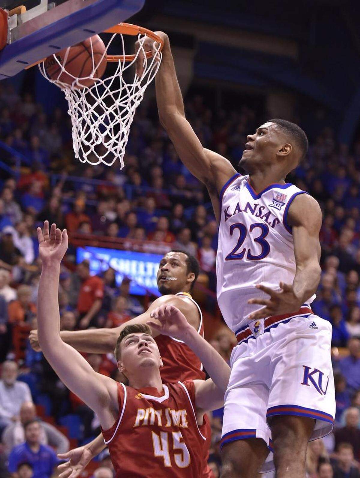 Billy Preston (seen above dunking for Kansas in an exhibition game) is currently projected to go either undrafted or in the second round by most NBA mock drafts, this just a year after he was trending towards being a first-rounder.