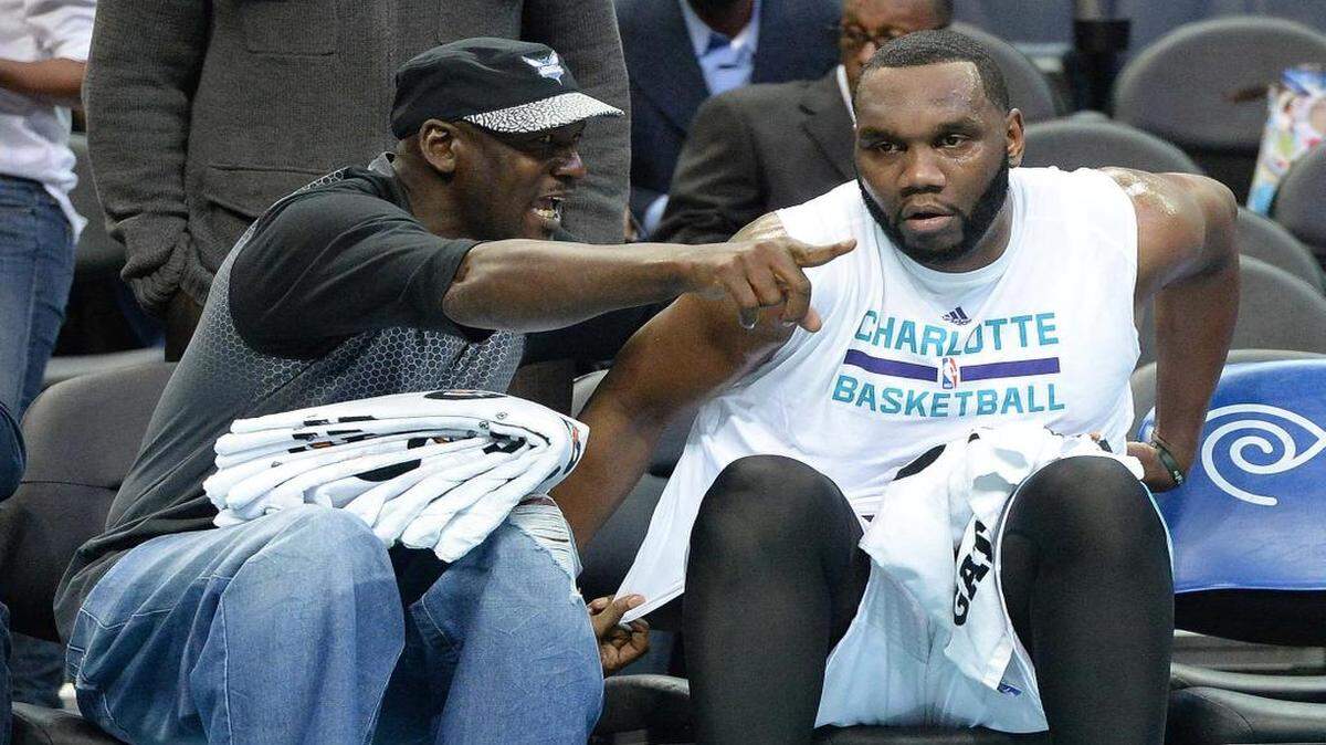 
Charlotte Hornets center Al Jefferson (right), pictured here with team owner Michael Jordan, says he needs to lose 20-25 pounds this summer to ease stress on his knees.
