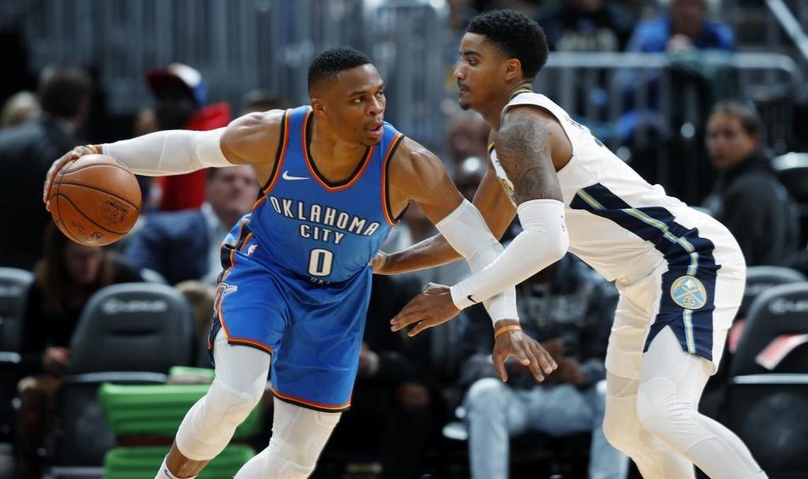Looking to keep superstar guard Russell Westbrook, left, interested in staying long-term, the Oklahoma City Thunder managed to trade for two name players in Paul George and Carmelo Anthony.