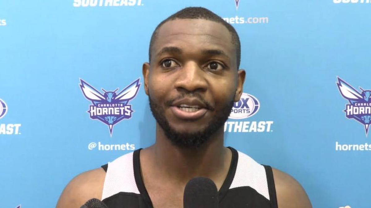 Former Charlotte 49ers center Joseph Uchebo talks with media following Wednesday’s summer-league workout with the Charlotte Hornets.