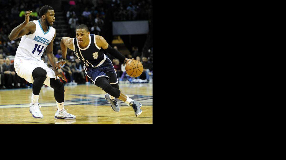 
Charlotte Hornet Michael Kidd-Gilchrist, left, shown guarding Oklahoma City Thunder star Russell Westbrook, says he aspires to be the best NBA defender ever.
