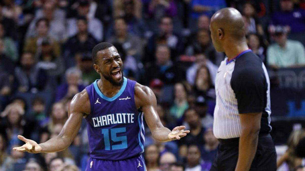 Charlotte Hornets guard Kemba Walker argues with official Courtney Kirkland that he was fouled during Sunday’s 123-103 loss to the Toronto Raptors at Spectrum Center.