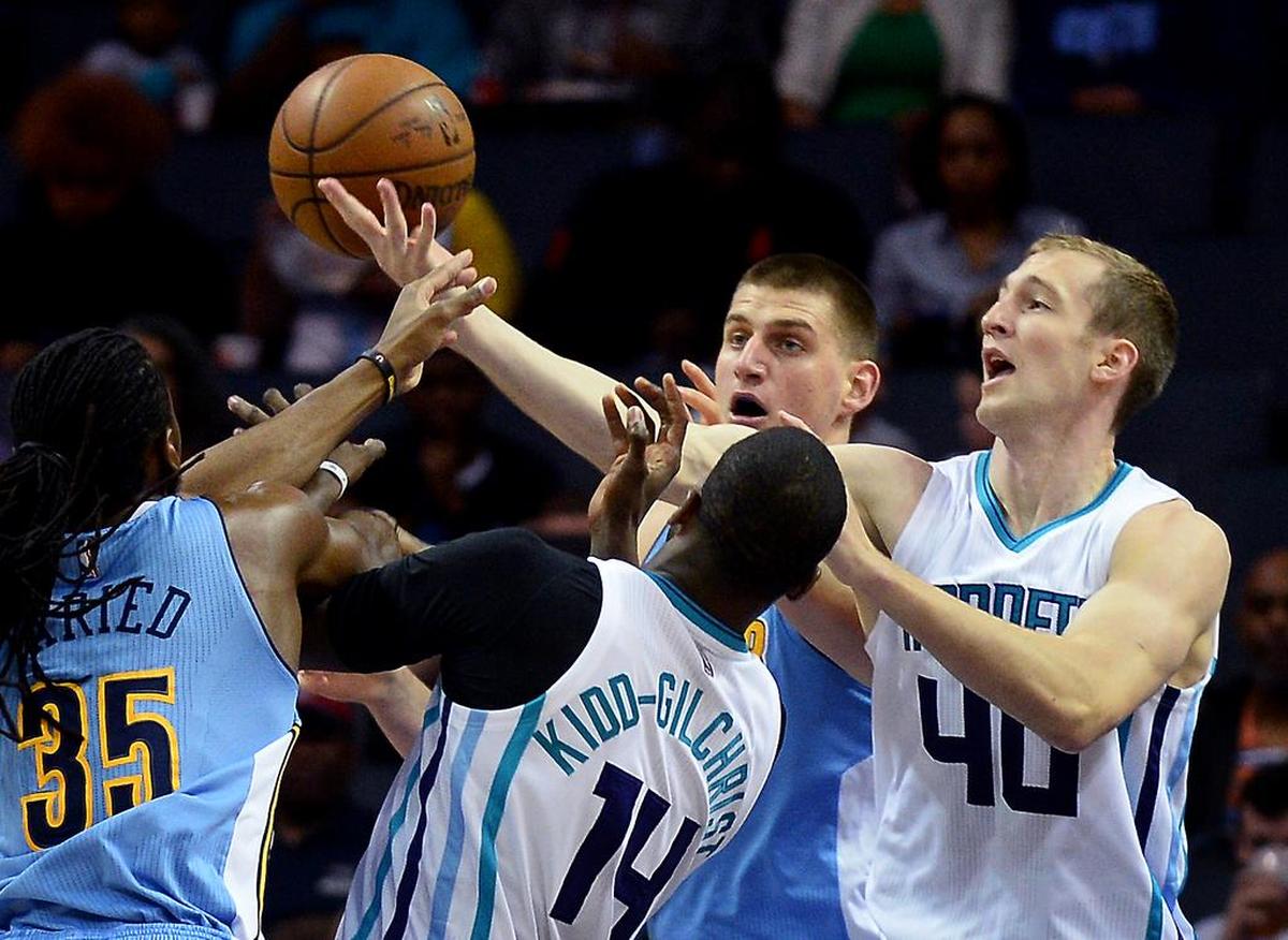 Charlotte Hornets center Cody Zeller (far right) has played for seven years in Charlotte.