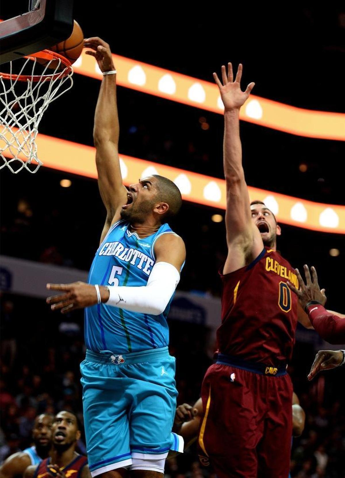 Charlotte Hornets guard Nicolas Batum, left, made seven of his first nine shots in his return Wednesday from a torn ligament in his left elbow, suffered in the preseason.