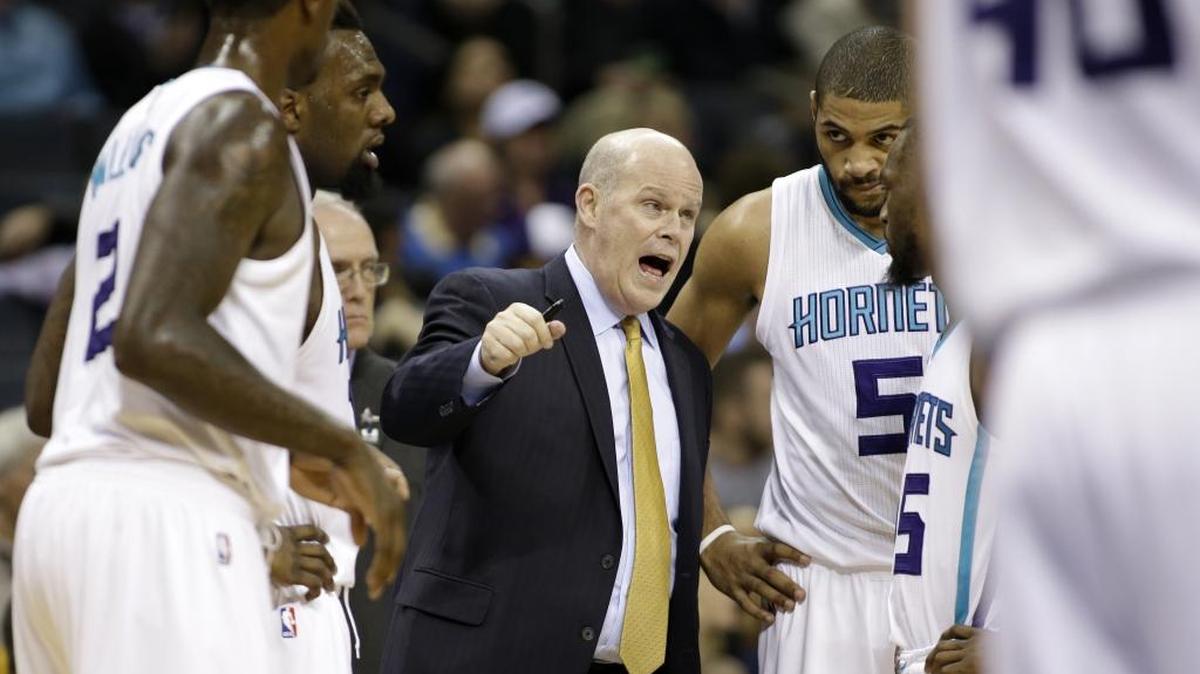The Charlotte Hornets' head coach Steve Clifford, middle, coaches his players, Marvin Williams, left, P.J. Hairston, Nicolas Batum and Kemba Walker, right, during Wednesday’s game in Charlotte. The Hornets won 107-84.
