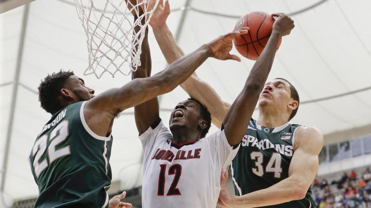 Charlotte Hornets rookie Mangok Mathiang (12) played for coach Rick Pitno at Louisville. Pitino was placed on administrative leave by the school Wednesday, which could lead to his termination.