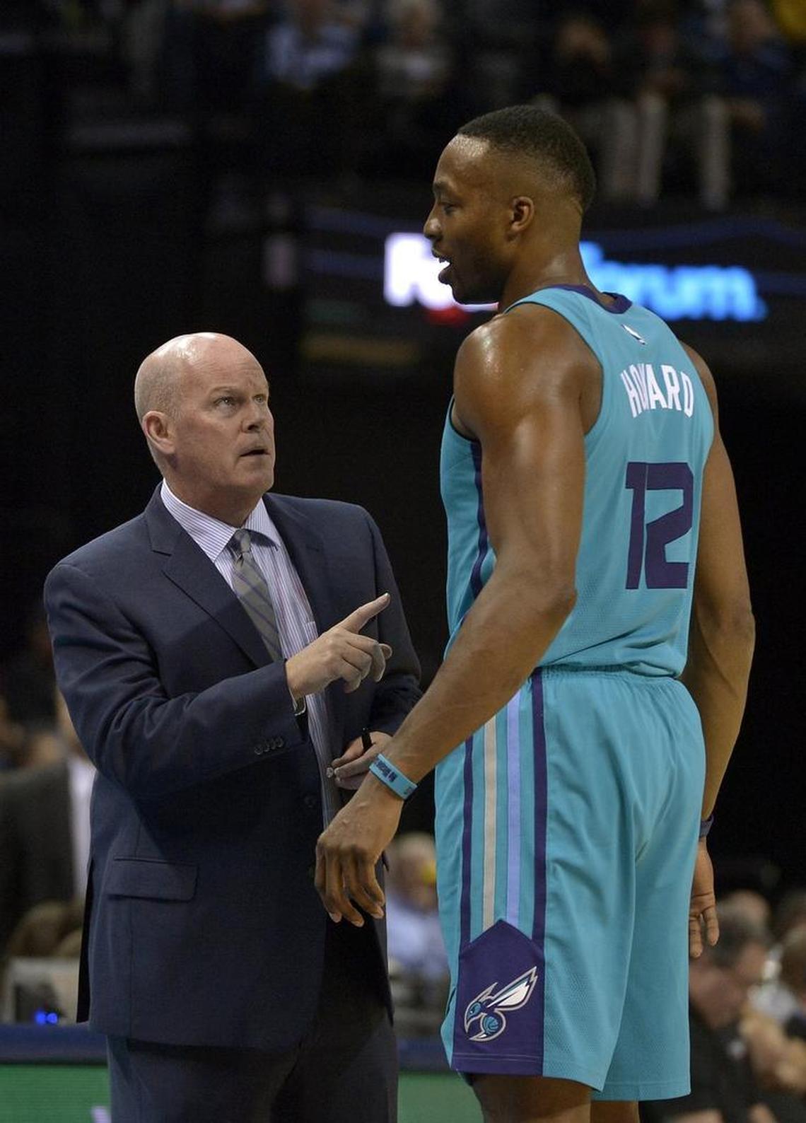 Charlotte Hornets center Dwight Howard (12) has a decade-long relationship with coach Steve Clifford (left)