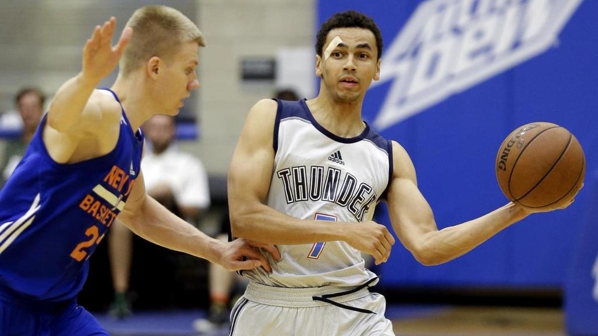 Former North Carolina guard Marcus Paige, right, will sign a two-way contract with the Charlotte Hornets. That means he will play primarily for the Hornets’ G-League affiliate, the Greensboro Swarm, next season.