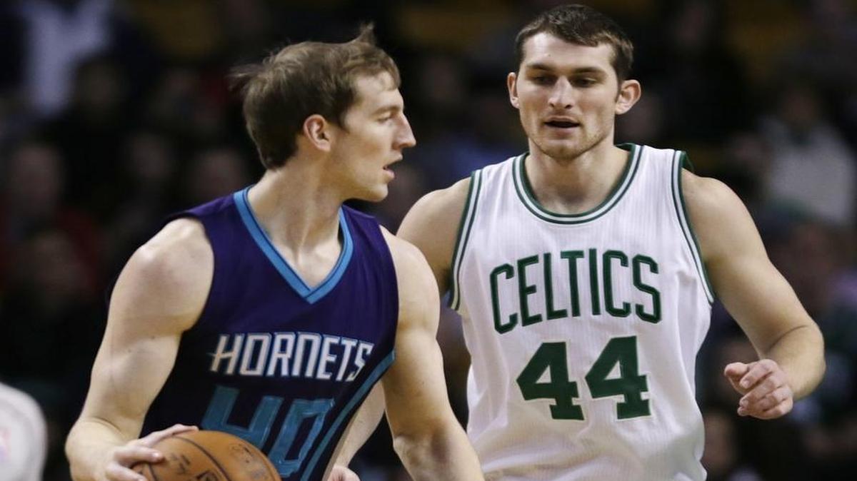 Boston Celtics center Tyler Zeller (44) defends his brother Charlotte Hornets center Cody Zeller (40) in a game last season.
