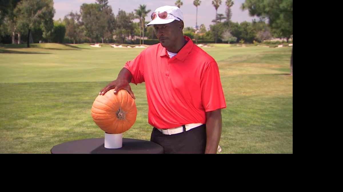 
Michael Jordan attempts to palm a pumpkin on “Jimmy Kimmel Live.”
