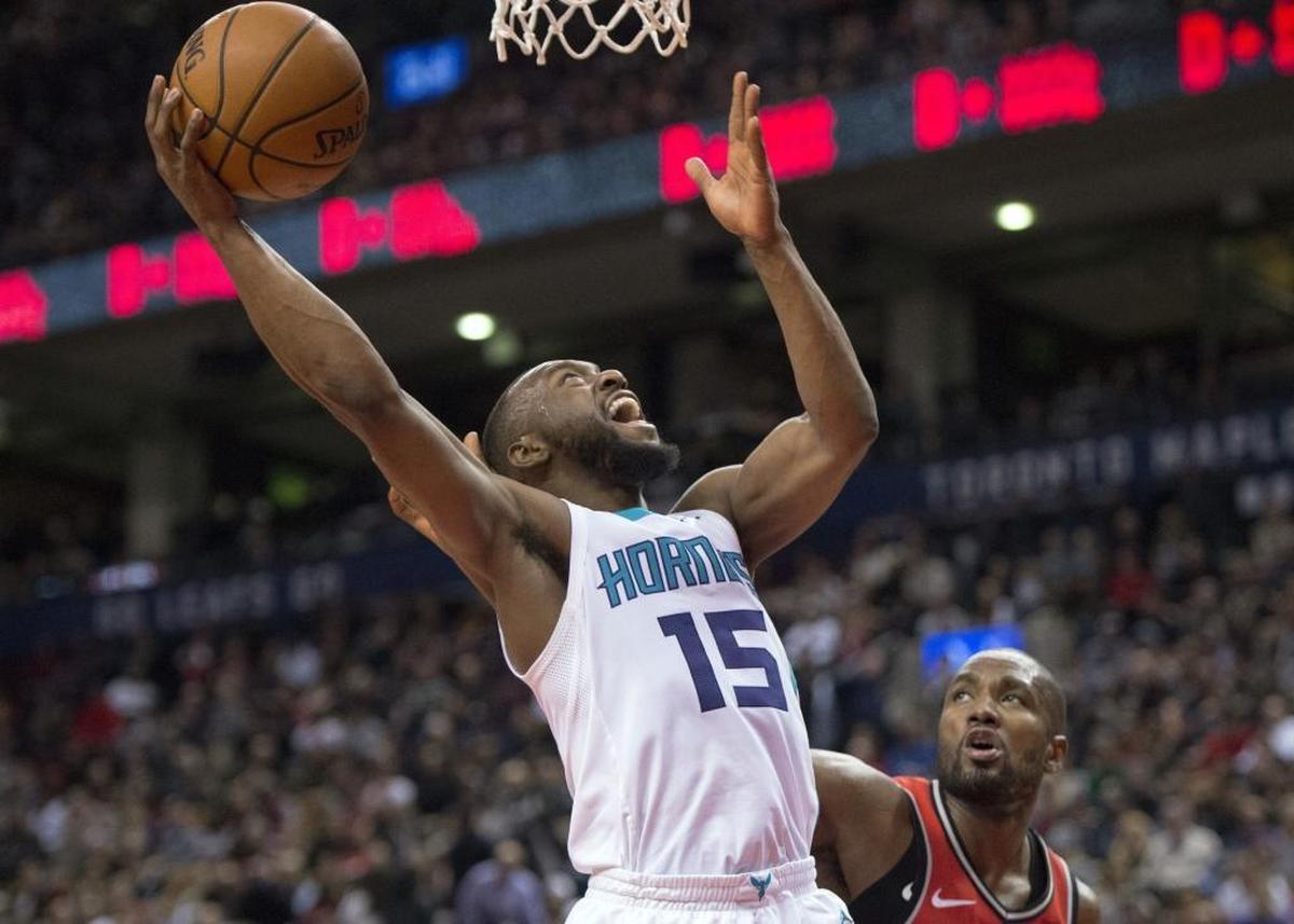 Charlotte Hornets guard Kemba Walker (15) scored 27 points in Sunday’s game at Toronto. The Hornets lost their third straight, all on the road.