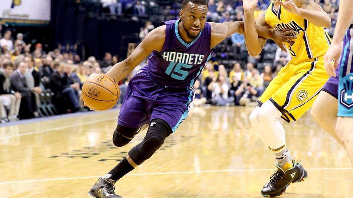 Kemba Walker #15 of the Charlotte Hornets dribbles the ball during the game against the Indiana Pacers at Bankers Life Fieldhouse on February 10, 2016 in Indianapolis, Indiana.