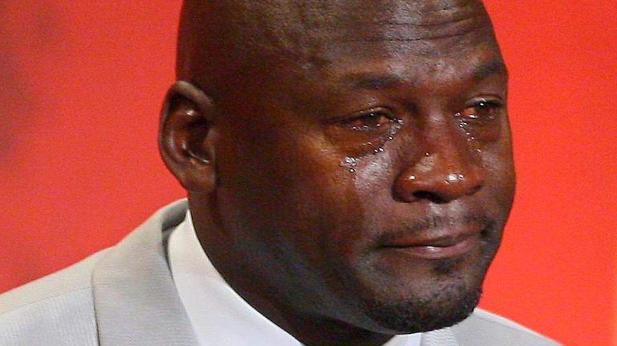Former Chicago Bulls and Washington Wizards guard Michael Jordan, now the owner of the Charlotte Hornets, cries as he takes the podium during his enshrinement ceremony into the Naismith Basketball Hall of Fame in Springfield, Mass., Sept. 11, 2009.