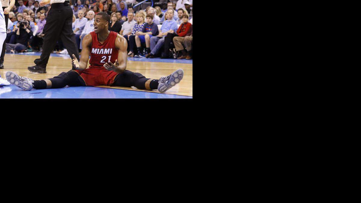 
Miami Heat center Hassan Whiteside (21) reacts to an officials call during an NBA game in March. This season, he’s shown great potential as well as committed technical fouls that have shown his lack of control. He’s been ejected twice this season and given the league nearly $40,000 in fines from technical and flagrant fouls, and ejections. 
