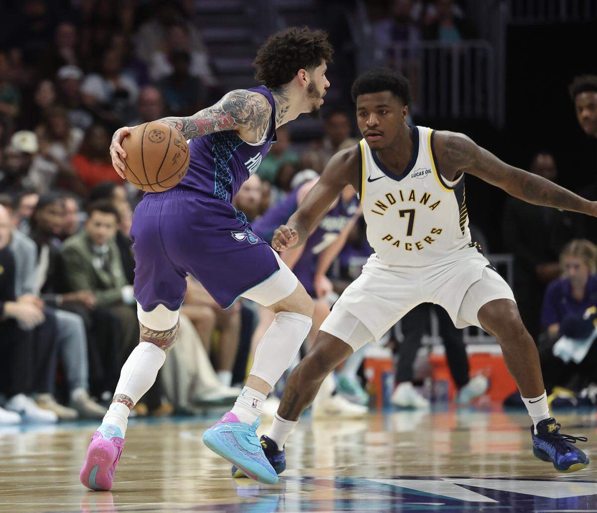 Charlotte Hornets guard LaMelo Ball drives against Indiana Pacers guard Kam Jones on April 3, 2026 at Spectrum Center in Charlotte.
