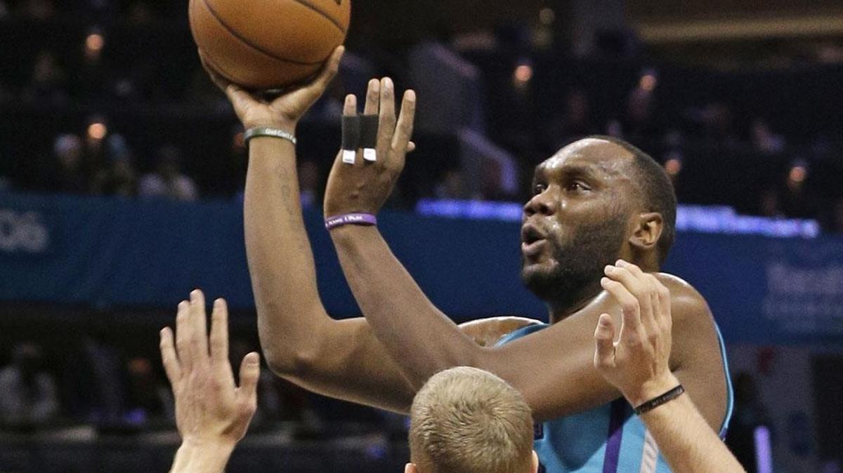 Charlotte Hornets center Al Jefferson (shooting here) broke out of a recent slump to score 29 points versus the Portland Trail Blazers.
