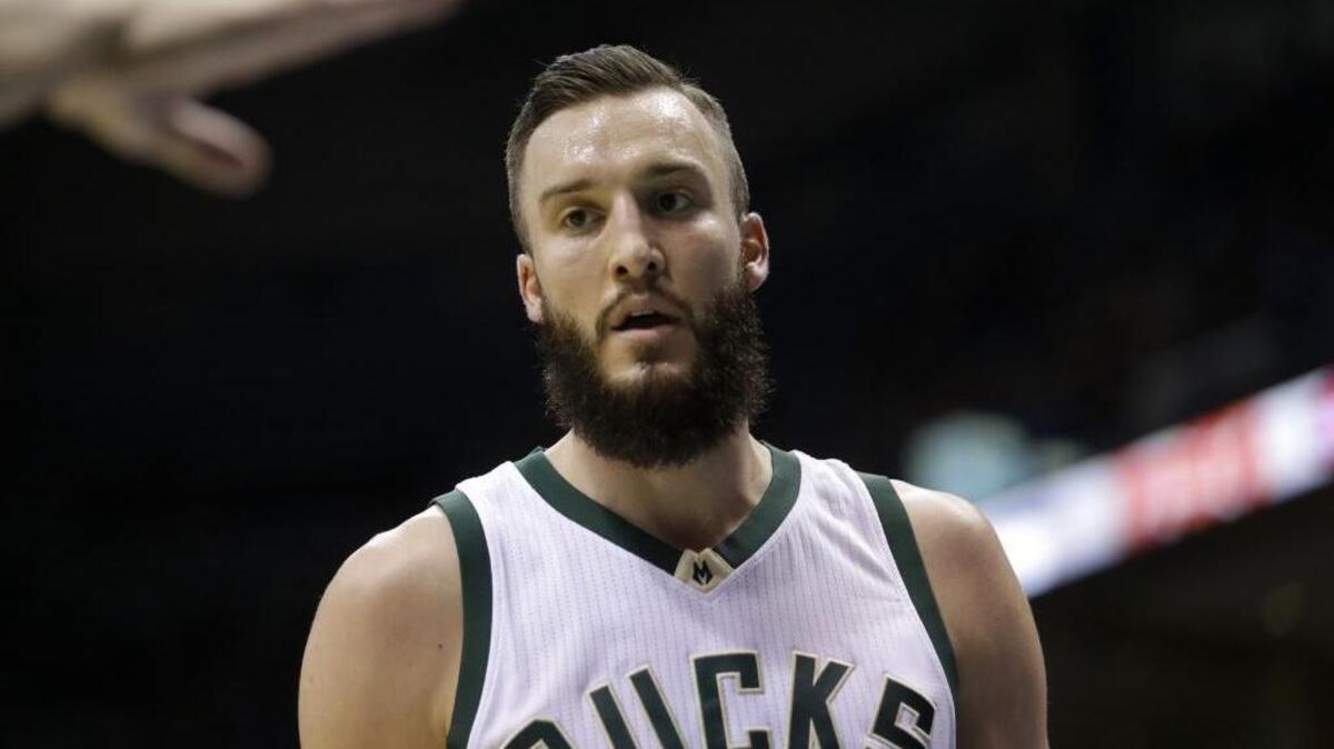 According to NBA sources, the Charlotte Hornets are in negotiations with the Milwaukee Bucks to acquire center Miles Plumlee, the former Duke standout.