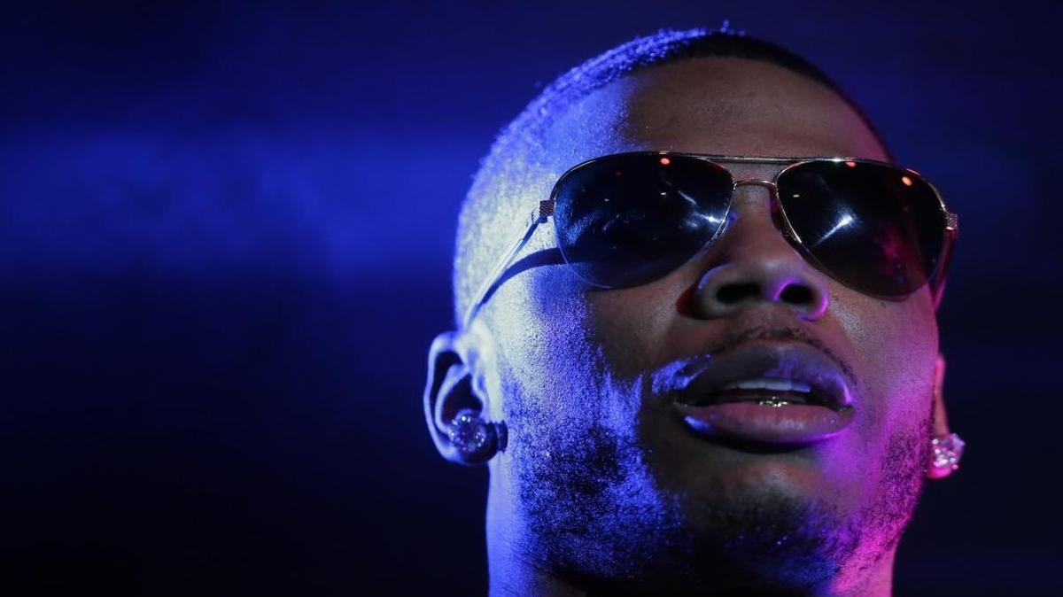 Rapper Nelly, who owns a small percentage of the Charlotte Hornets, was arrested in the Seattle area early Saturday morning after a woman accused him of sexual assault. His attorney strongly denied the accusation to the Associated Press.