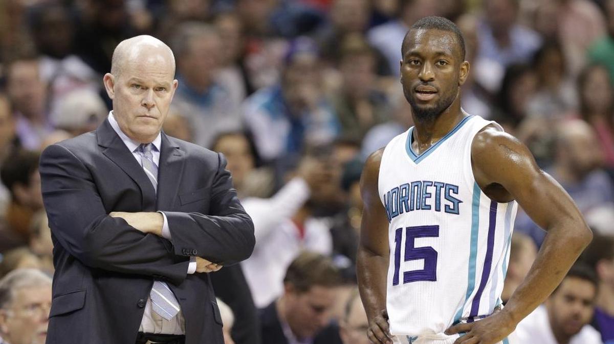 Charlotte Hornets point guard Kemba Walker (right) will play Monday versus the Orlando Magic, after missing two games with a sore left shoulder. However, coach Steve Clifford (left) missed morning shootaround with an illness. If Clifford can’t coach, associate head coach Stephen Silas will fill in.