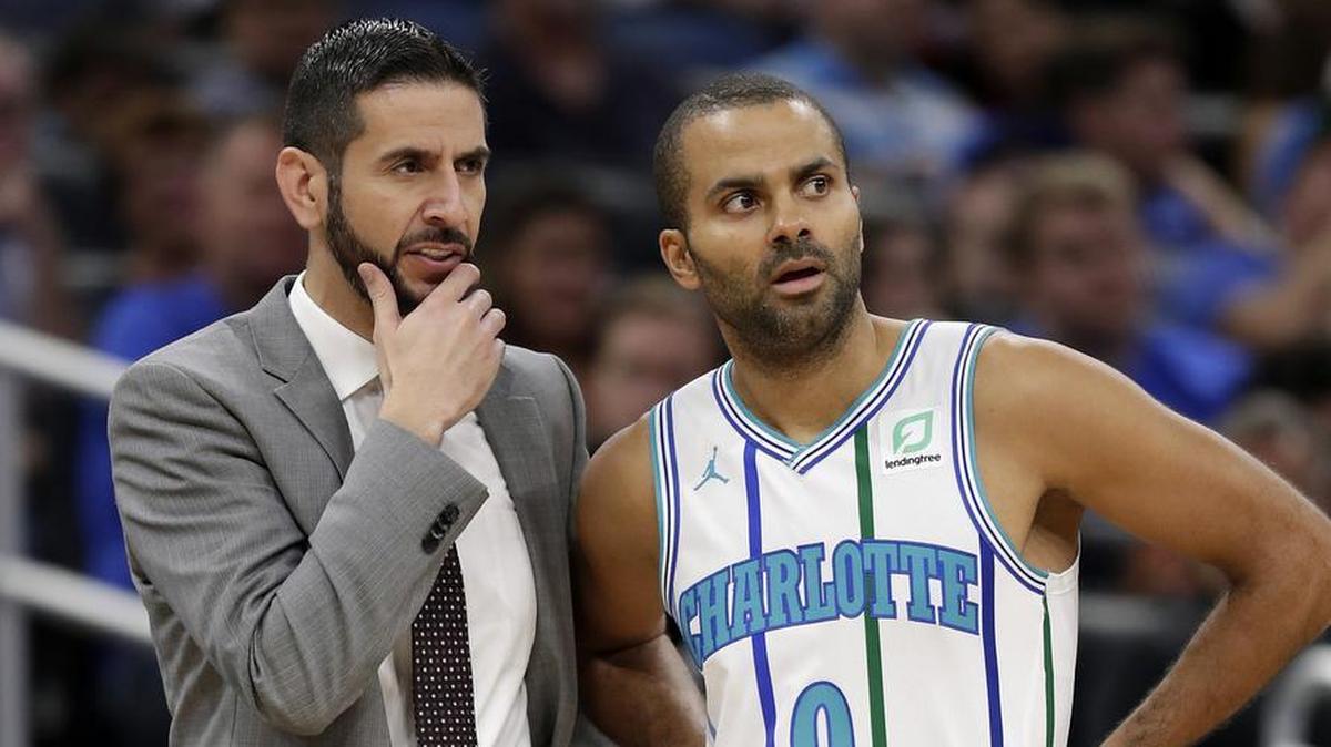 Charlotte Hornets guard Tony Parker, right, is providing veteran leadership for first-year head coach James Borrego. Friday, the Hornets improved to 1-1 with a 120-88 win against the Orlando Magic.