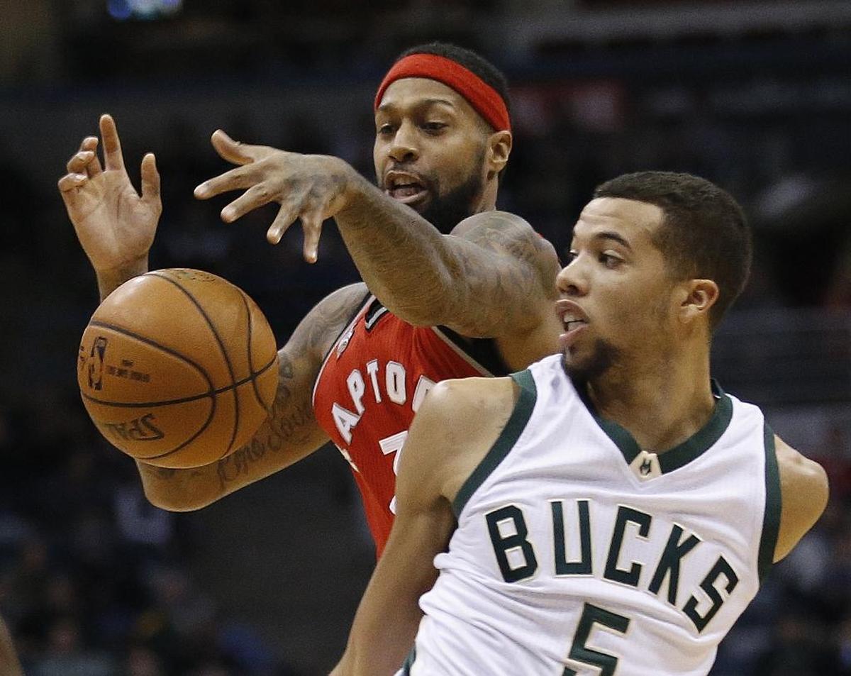 Point guard Michael Carter-Williams (5, then with the Milwaukee Bucks) will join his fourth NBA team when he signs a one-year contract with the Charlotte Hornets.