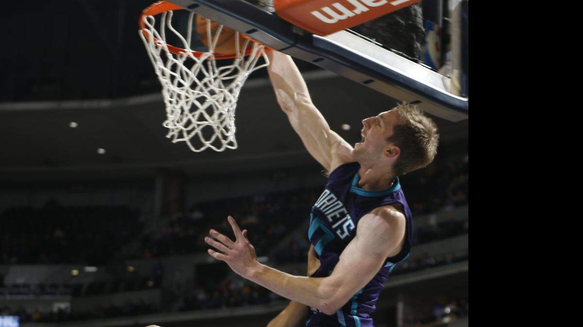 
Charlotte Hornets forward Cody Zeller (right) will miss three months following right shoulder surgery Wednesday.
