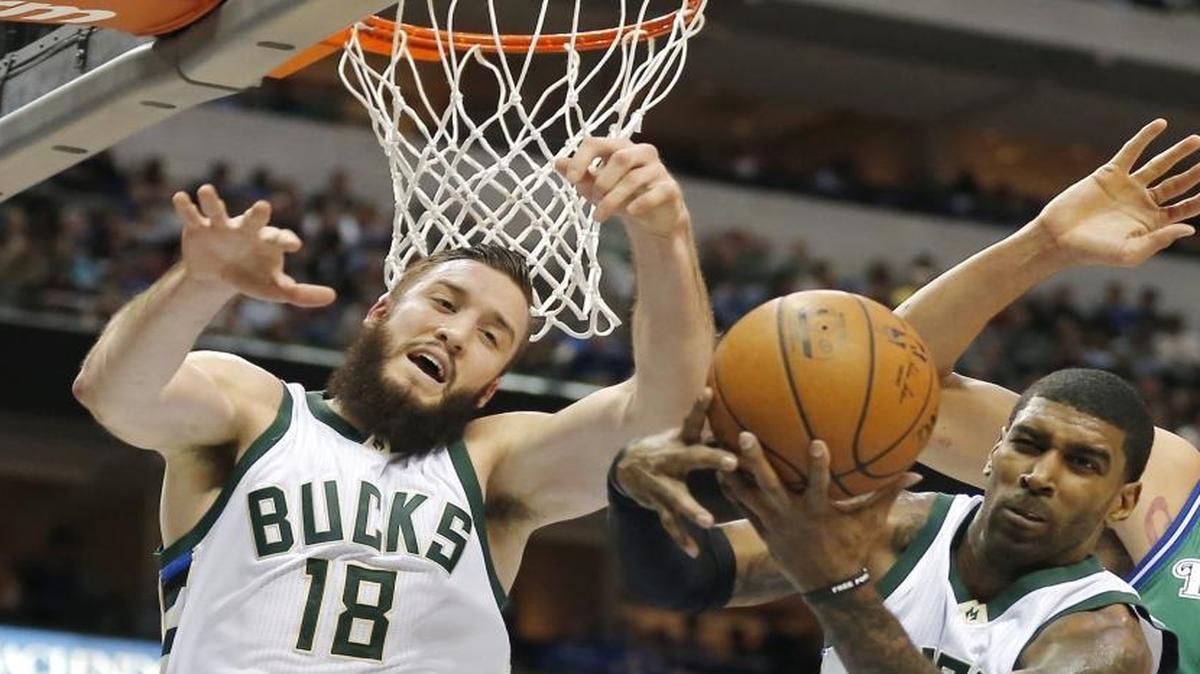 Former Duke standout Miles Plumlee (left) was traded on Thursday from the Milwaukee Bucks to the Charlotte Hornets.