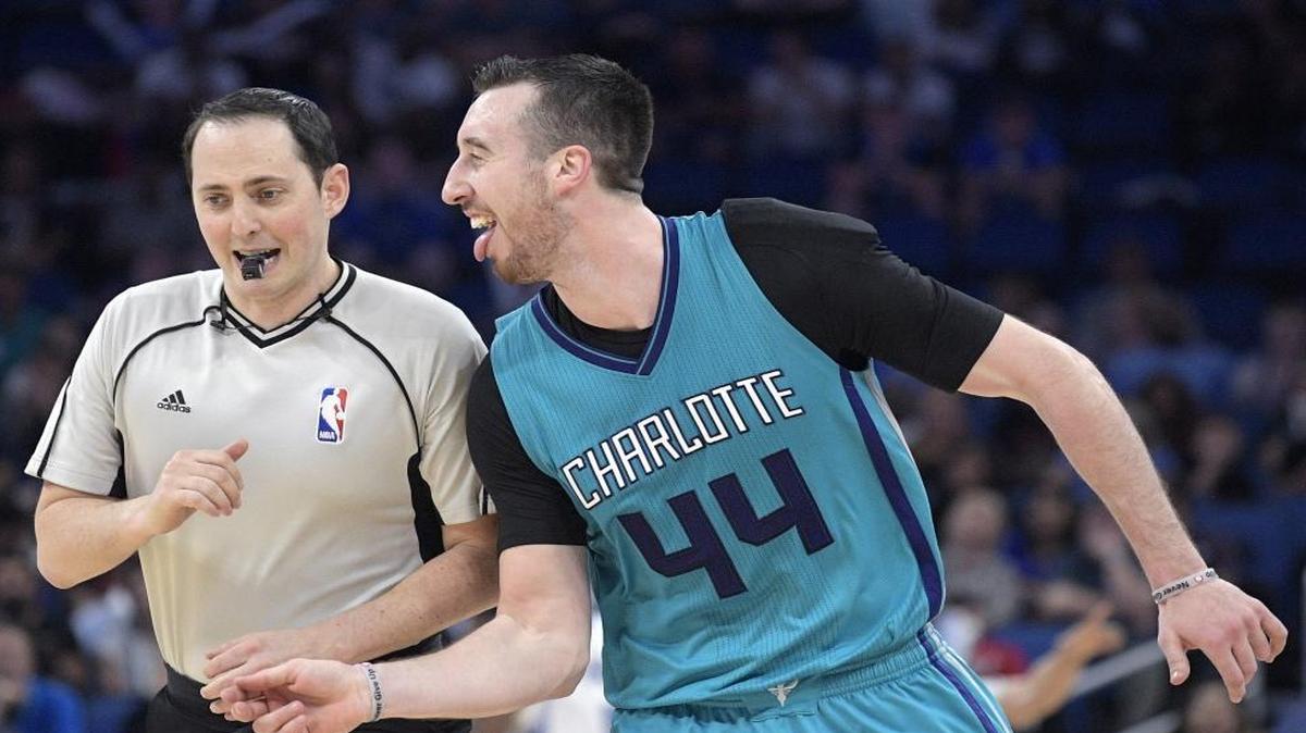 Charlotte Hornets center Frank Kaminsky (44) celebrates next to official Marat Kogut after making a three-point basket during the second half of Wednesday’s game. The Hornets won 109-102.