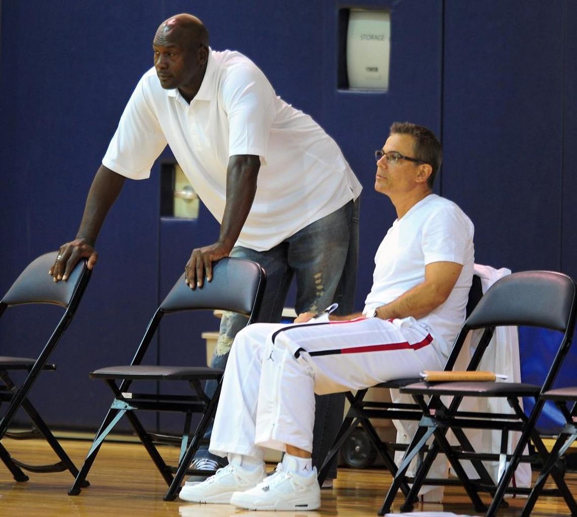Charlotte Hornets owner Michael Jordan (left) and vice chairman Curtis Polk (right) made the call after weekend discussions to cut ties Tuesday with general manager Rich Cho.