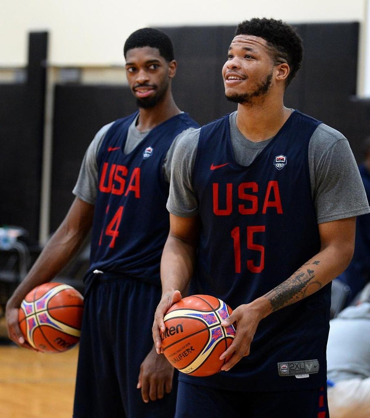 Former North Carolina standout and Charlotte native Kennedy Meeks, right, and former Duke forward Amile Jefferson seem to be enjoying Tuesday’s Team USA practice at the Spectrum Center.