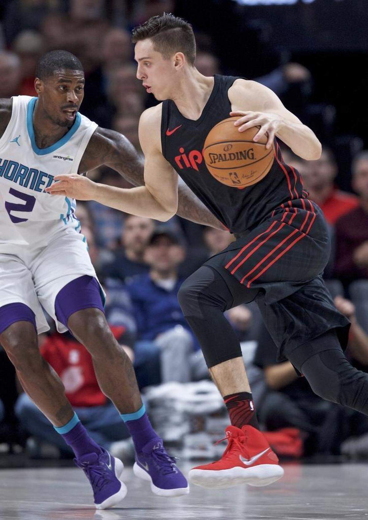 Hornets power forward Marvin Williams, left, working against Portland Trail Blazers center Zach Collins, returned Thursday following a four-game absence due to a left ankle sprain. Williams immediately returned to the starting lineup.