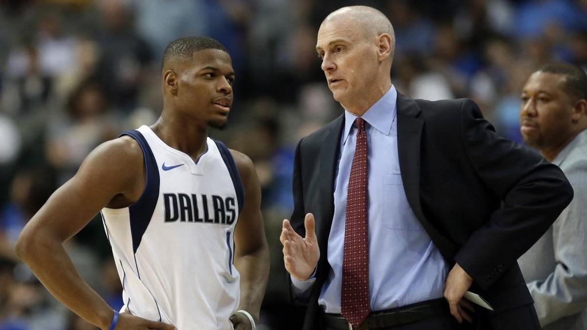 Dallas Mavericks coach Rick Carlisle (right) says rookie point guard Dennis Smith Jr. (1) is athletically dynamic in a way the Mavs haven’t had at point guard in awhile.