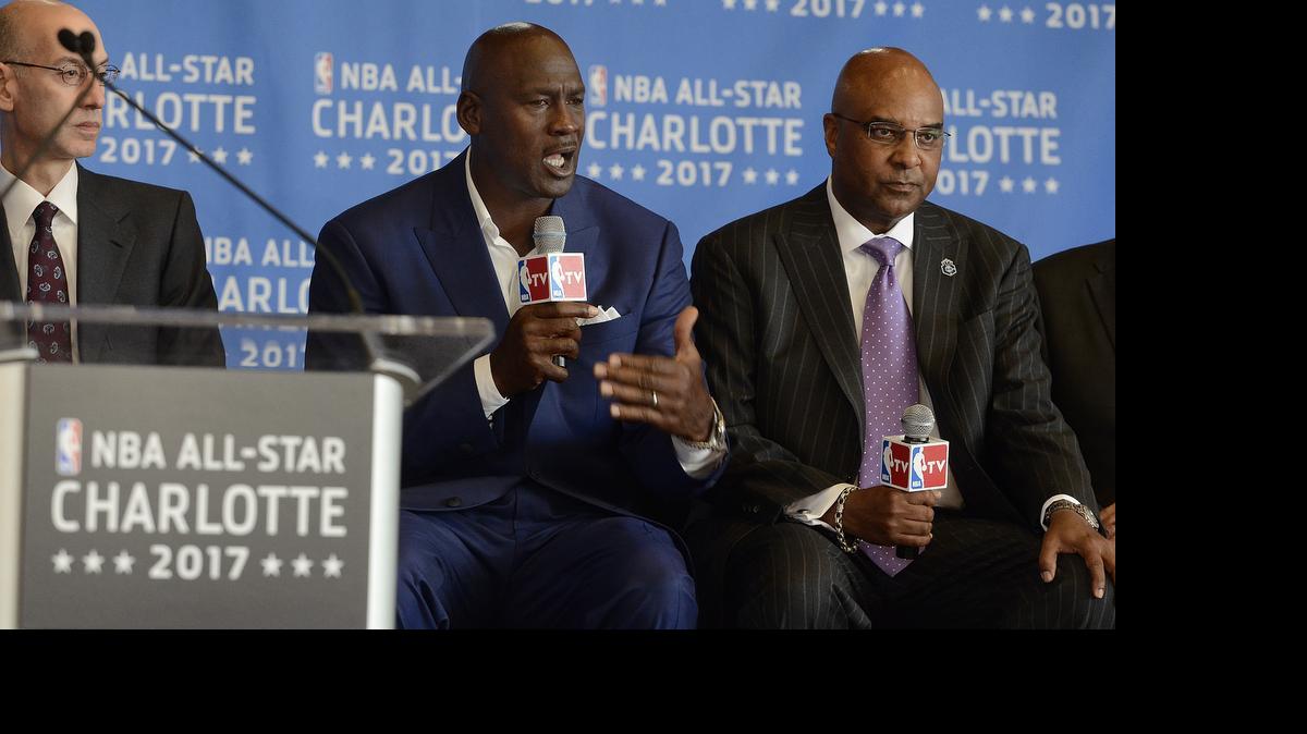 
Michael Jordan (center) answers a question during a press conference to announce that Charlotte was selected to host the NBA All-Star game in 2017. Jordan, a two-time Olympic gold medalist, is one of nine players who will be enshrined to the FIBA Hall of Fame in September.
