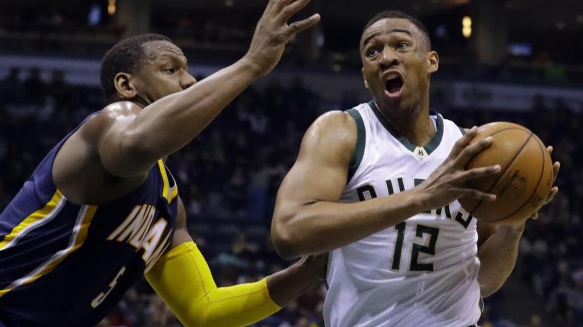 Milwaukee Bucks forward Jabari Parker (right) should be an entertaining matchup with Charlotte Hornet Michael Kidd-Gilchrist.