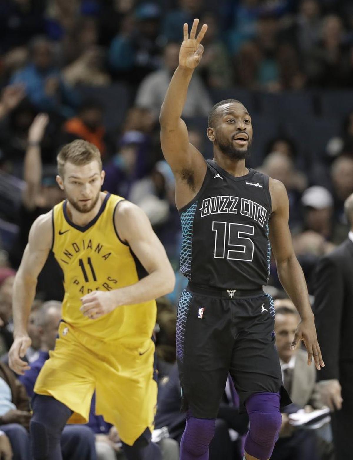 Charlotte’s Kemba Walker celebrates after making a basket against the Indiana Pacers during the second half of Friday’s game in Charlotte. Walker finished with 41 points.