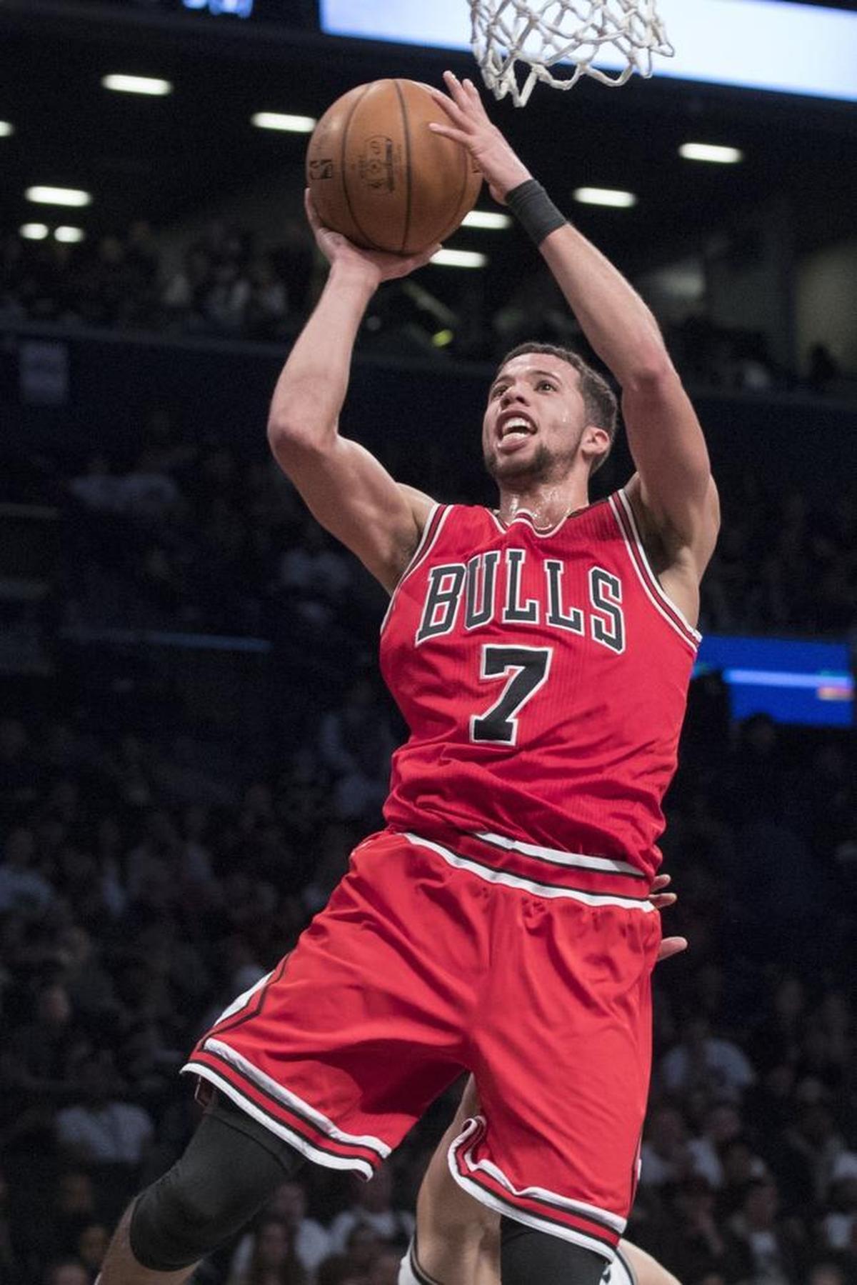 Michael Carter-Williams (7), here playing for the Chicago Bulls, will back up Kemba Walker at point guard with the Charlotte Hornets.