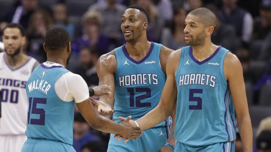 Charlotte Hornets Kemba Walker, left, Dwight Howard, center, and Nicolas Batum all performed well in Tuesday’s dominant road victory over the Sacramento Kings.