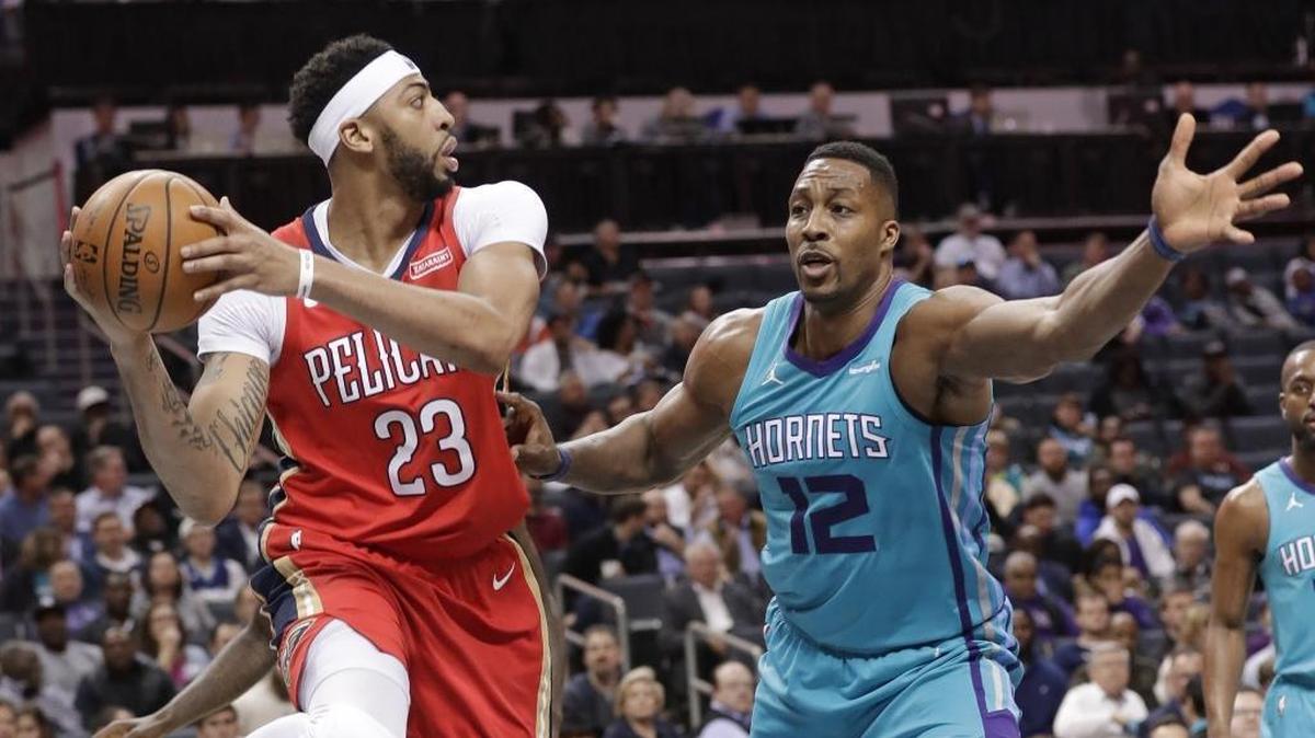 Charlotte Hornets center Dwight Howard (12) played his 1,000th NBA game Wednesday, matched often against the New Orleans Pelicans’ Anthony Davis (23).