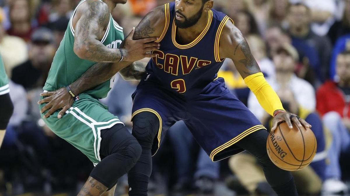 The Cleveland Cavaliers and Boston Celtics agreed to a trade Tuesday night that will include point guards Isaiah Thomas (left) and Kyrie Irving (right). Former Duke star Irving requested a trade out of Cleveland.
