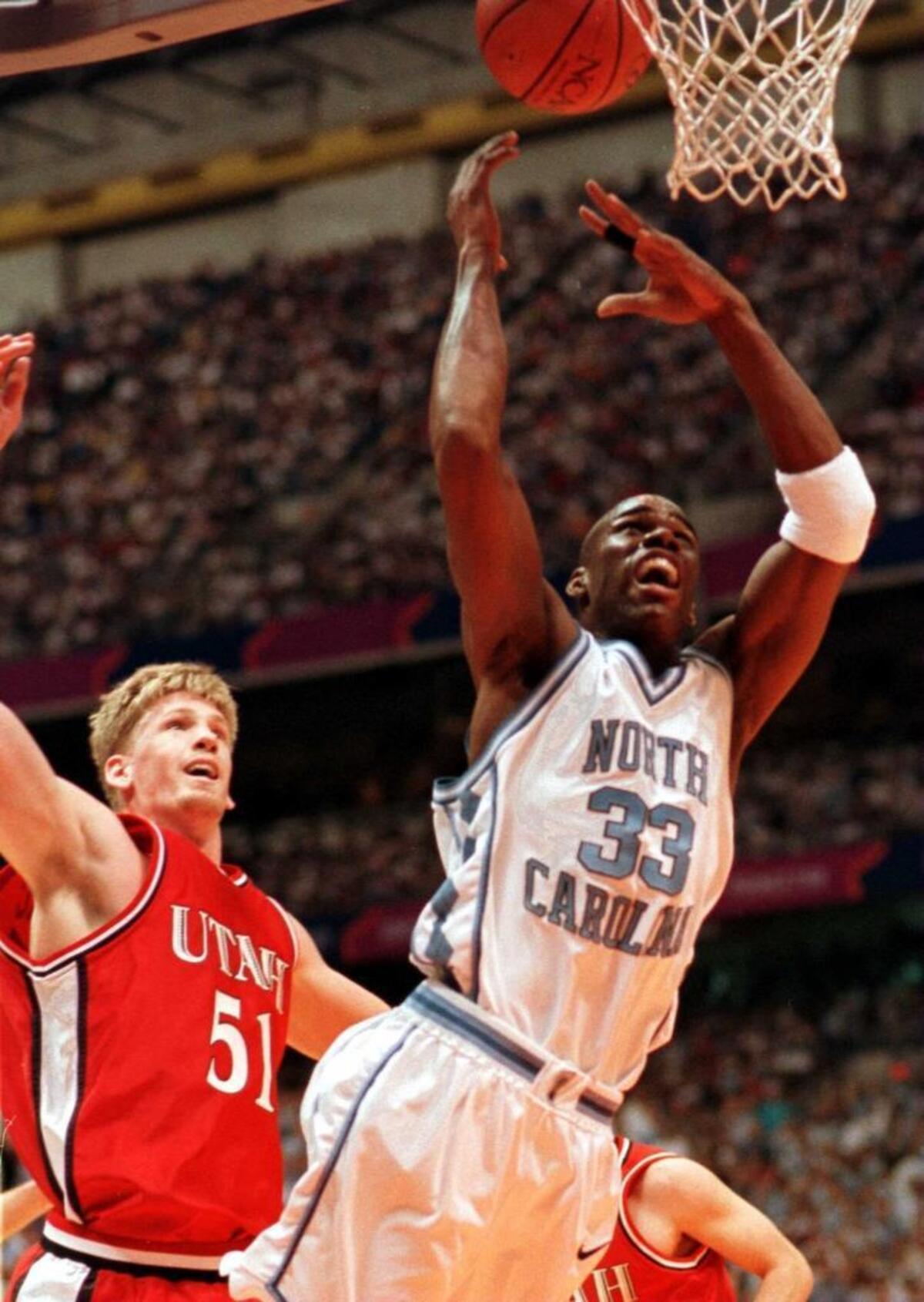 Former North Carolina All-American Antawn Jamison (right) was college basketball’s national player of the year in 1997-98.