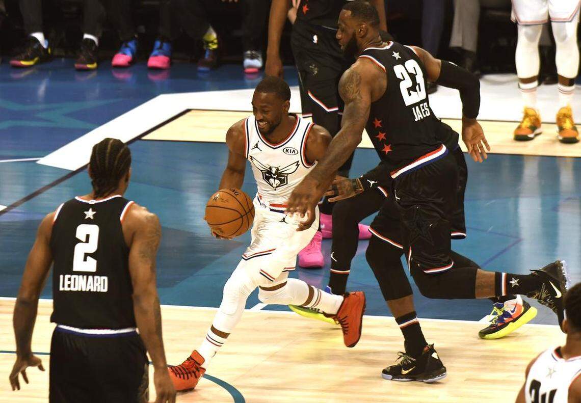 Charlotte Hornets’ Kemba Walker drives to the net as Los Angelas Lakers’ LeBron James tries to defend him Goldenstate Warriors’ Stephen Curry and Charlotte Hornets’ Kemba Walker during the 2019 NBA All-Star Game in Charlotte.
