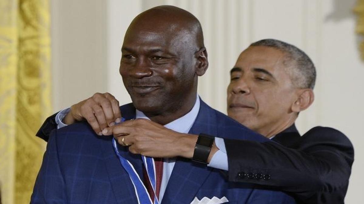 Former President Barack Obama presents Michael Jordan with the Presidential Medal of Freedom last November. Now Obama is playing for Jordan’s team, the Charlotte Hornets, in one gamer’s NBA 2K17 game.