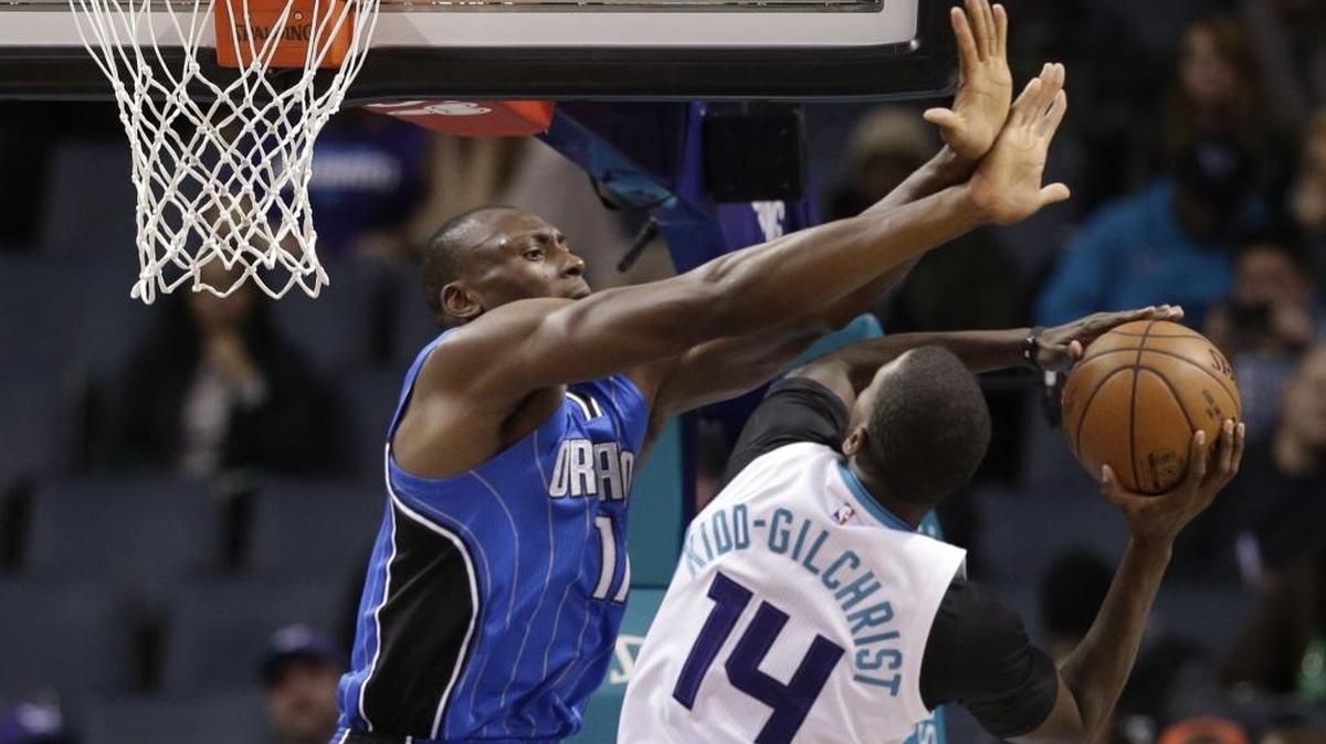 Charlotte Hornets' Michael Kidd-Gilchrist tries to shoot over the Orlando Magic's Bismack Biyombo in a game earlier this month.